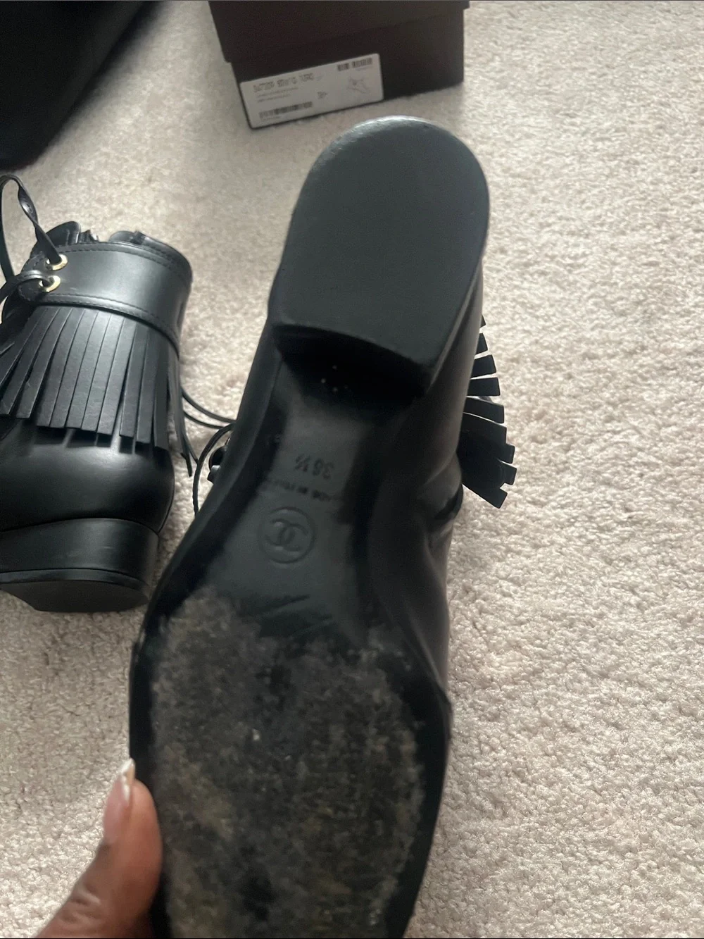 CHANEL Black Leather Heeled Ankle Boots with CC Embossing